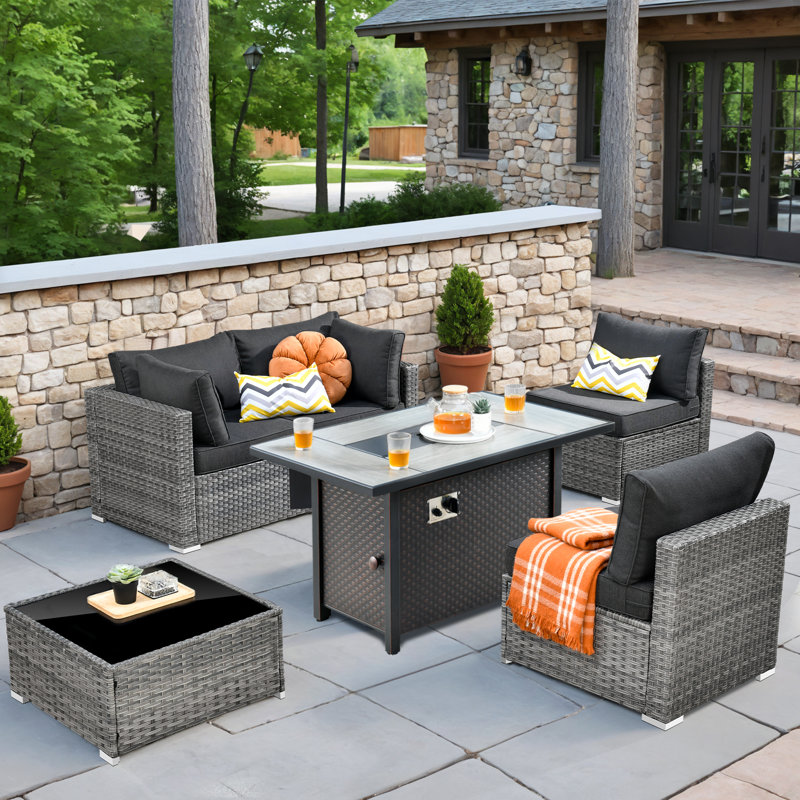 Latitude Run Wicker 4 Person Outdoor Conversation Set With Fire Pit Table With Cushions Wayfair